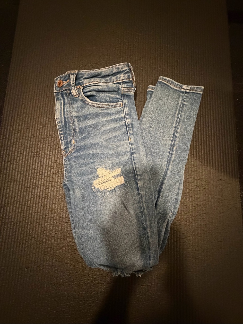 American Eagle Outfitters Medium Blue Skinny Jeans with Distressed Knee